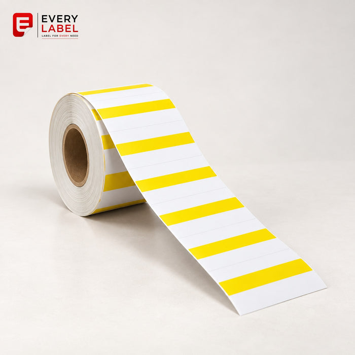 Roll of shelf edge tag labels, white with yellow bands